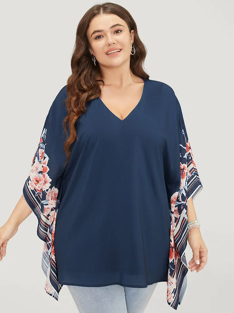 Floral Print Asymmetrical Dolman Sleeve Blouse sold by Bloomchic