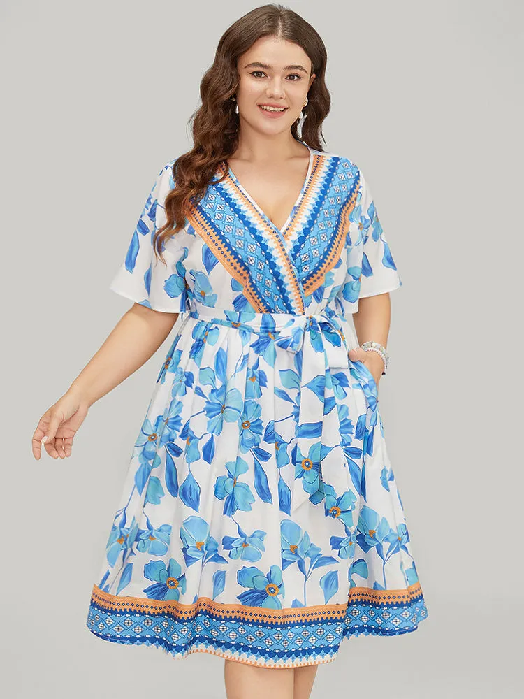 Bandana Print Ruffle Hem Belted Pocket Wrap Dress sold by Bloomchic