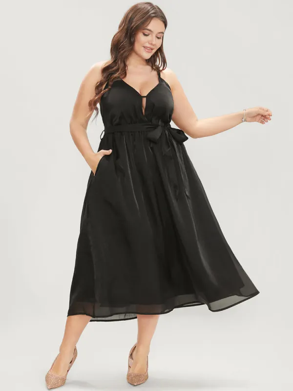 Solid Crisscross Back Mesh Pocket Belted Spaghetti Strap Dress sold by Bloomchic