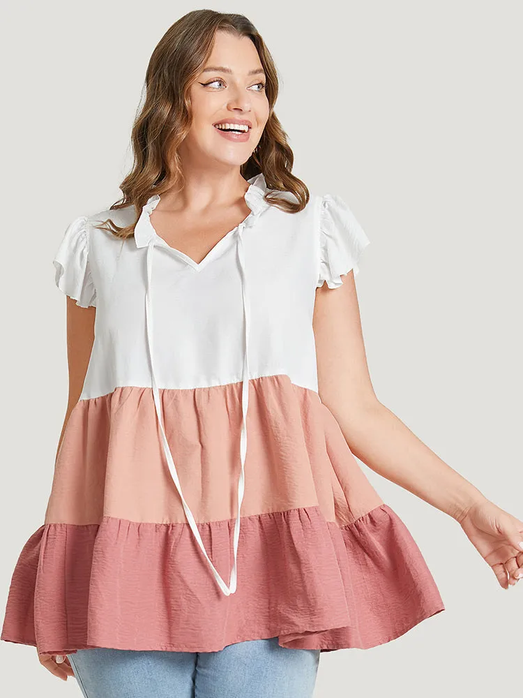 Colorblock Contrast Cap Sleeve Tie Neck Ruffle Tiered Blouse sold by Bloomchic