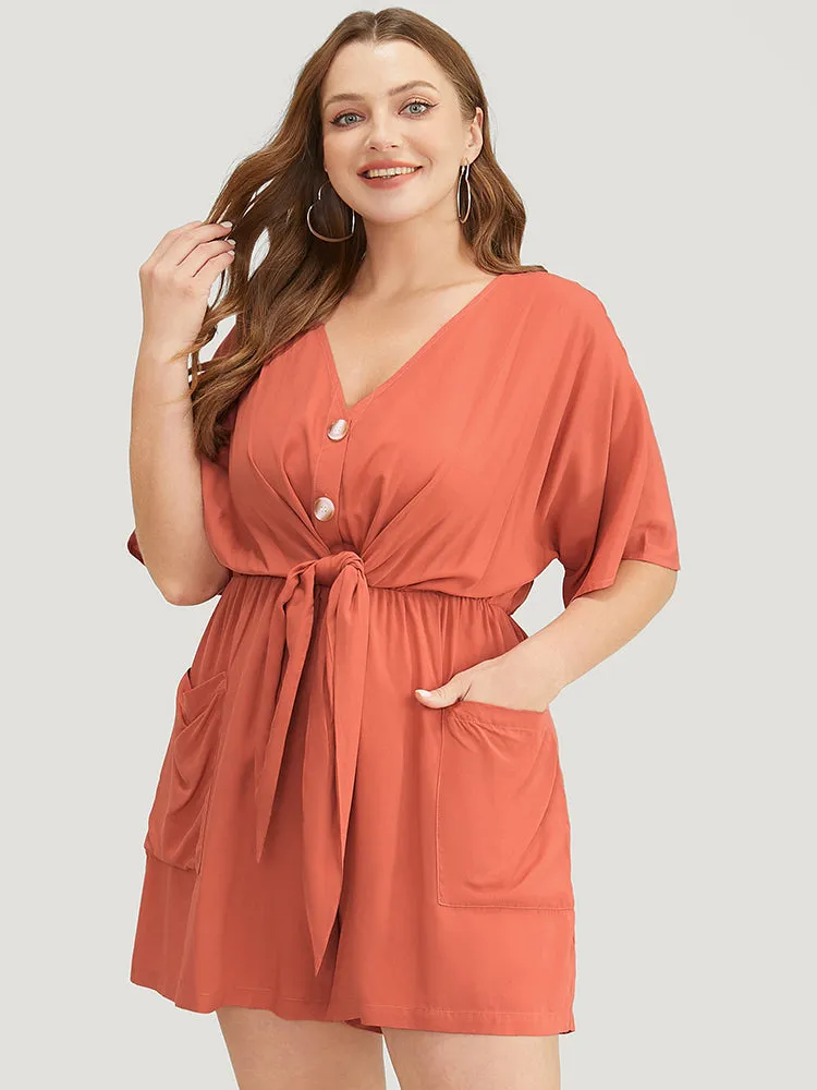 Solid Pocket Button Up Belted Knotted Front Romper sold by Bloomchic