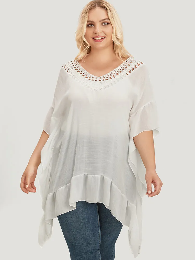 Solid Ruffle Trim Dolman Sleeve Lace Asymmetrical Hem Knit Top sold by Bloomchic