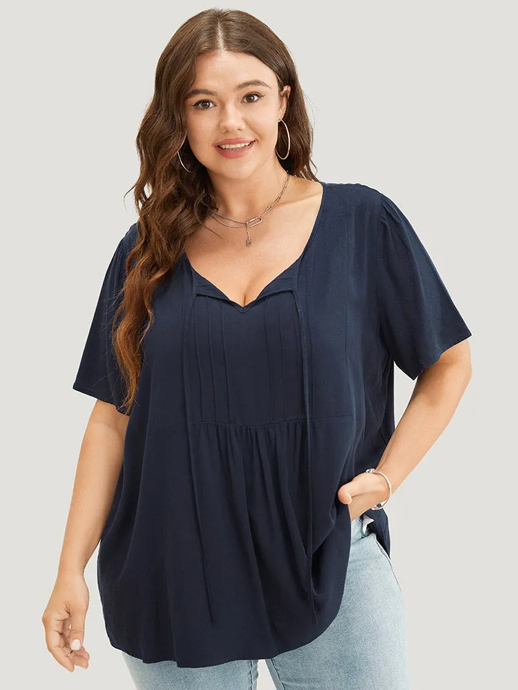Solid Pleated Detail Tie Neck Ruffle Blouse sold by Bloomchic