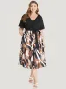 Graphic Print Pocket Ruffle Surplice Neck Belt Dress sold by Bloomchic