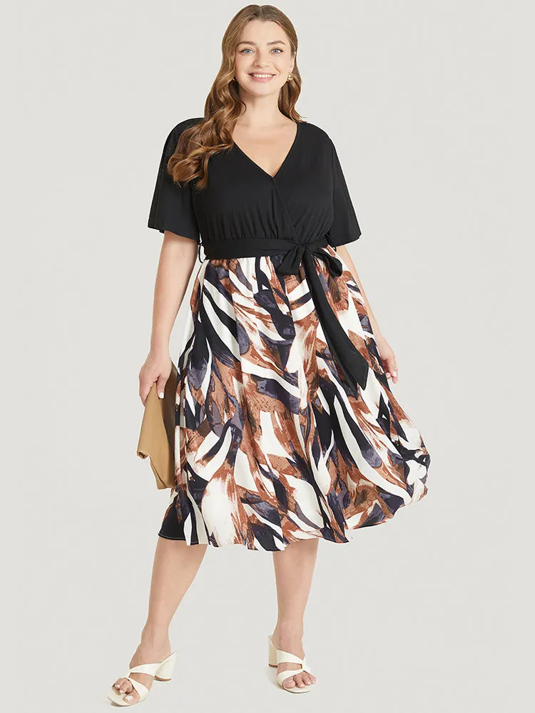 Graphic Print Pocket Ruffle Surplice Neck Belt Dress sold by Bloomchic
