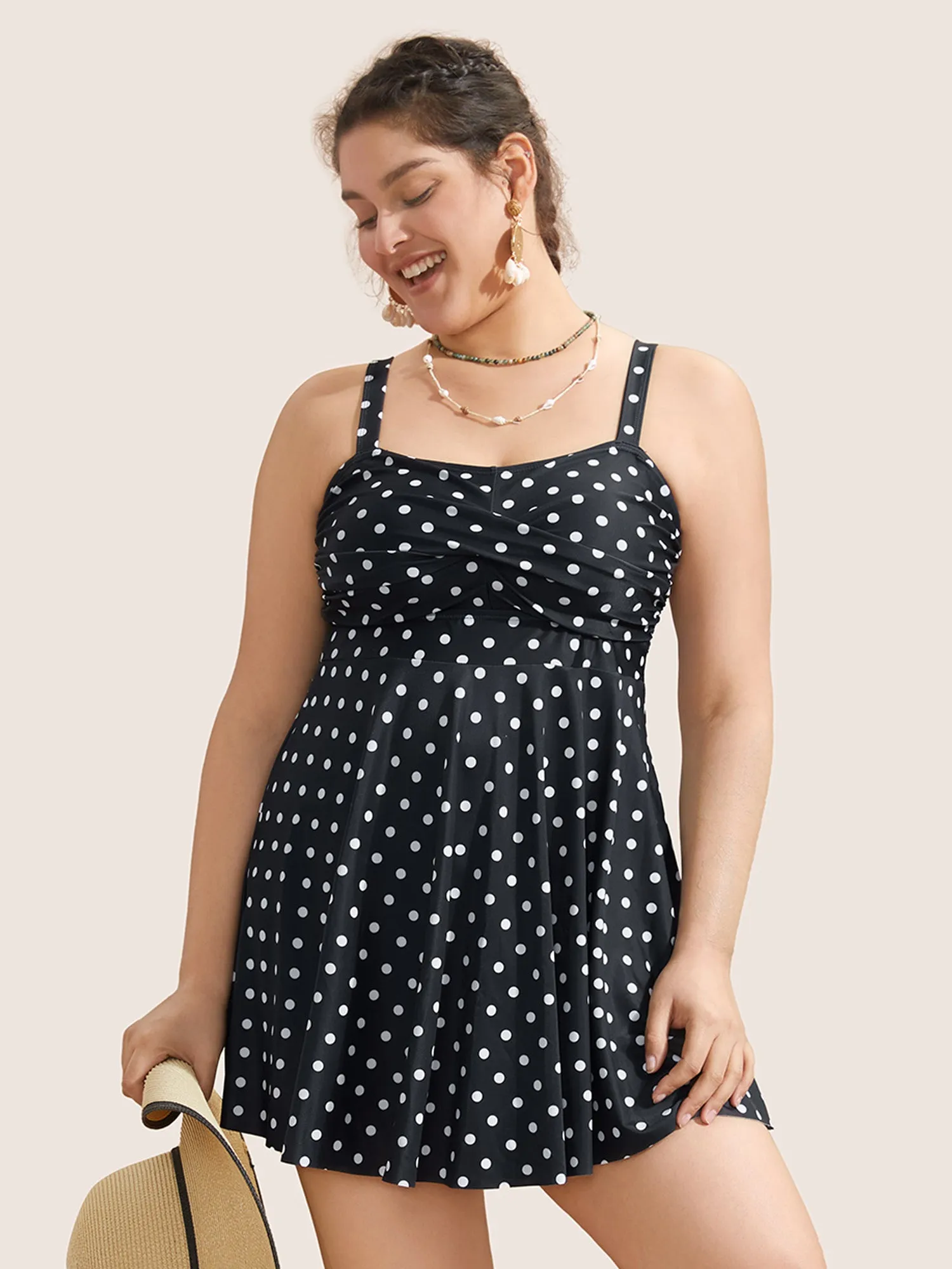 Polka Dot Crossover Ruched Flutter Hem Swim Dress sold by Bloomchic