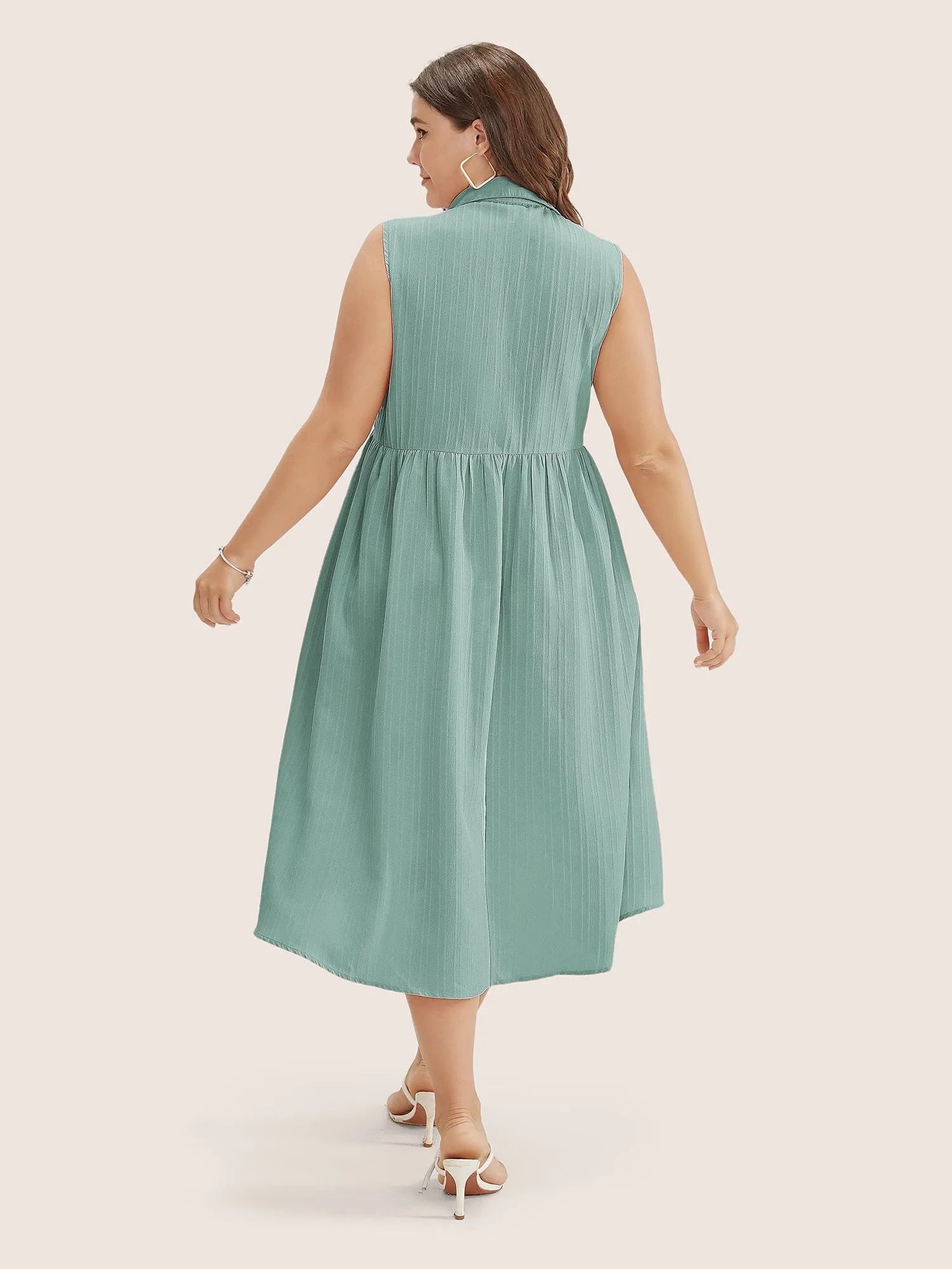 Solid Shirt Collar Ruffle Pocket High Low Hem Button Up Dress sold by Bloomchic product image thumbnail 5