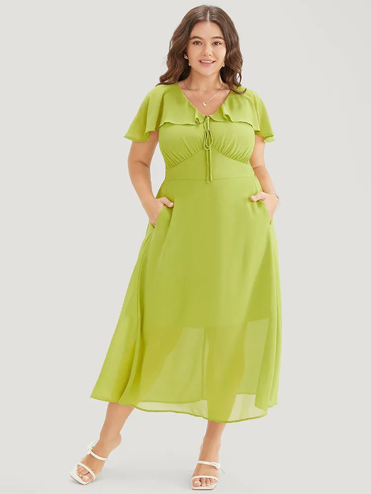 Solid Ruffle Trim Pocket Empire Waist Knot Cape Detail Dress sold by Bloomchic product image thumbnail 3