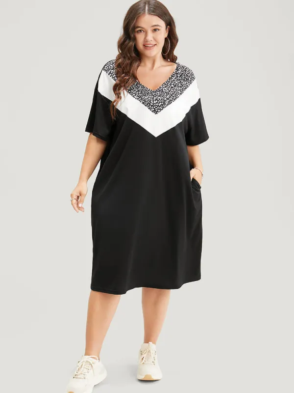 Leopard Contrast Pocket Arc Hem Dress sold by Bloomchic