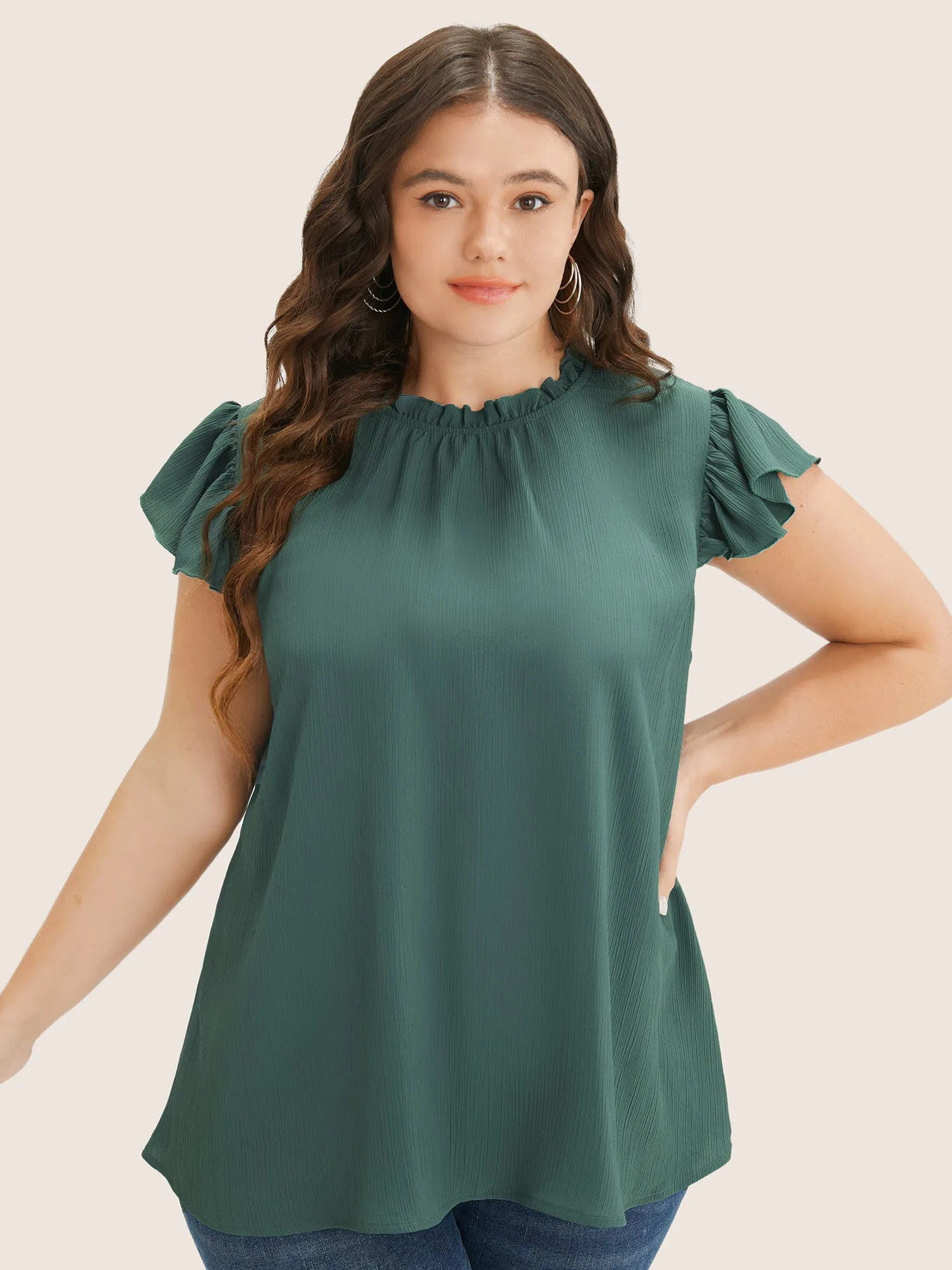Plain Mock Neck Cap Sleeve Ruffle Trim Blouse sold by Bloomchic