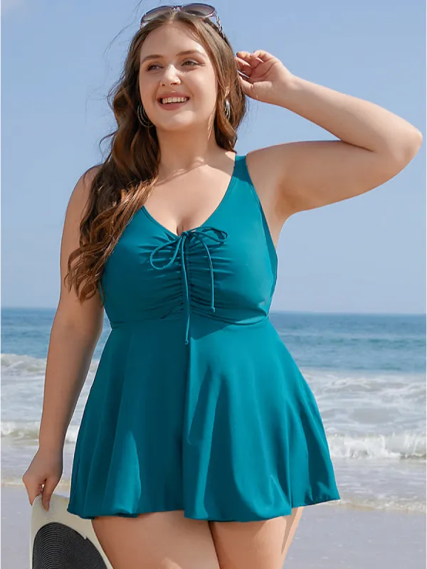 Drawstring Adjustable Straps Ruffle Hem Swim Dress sold by Bloomchic