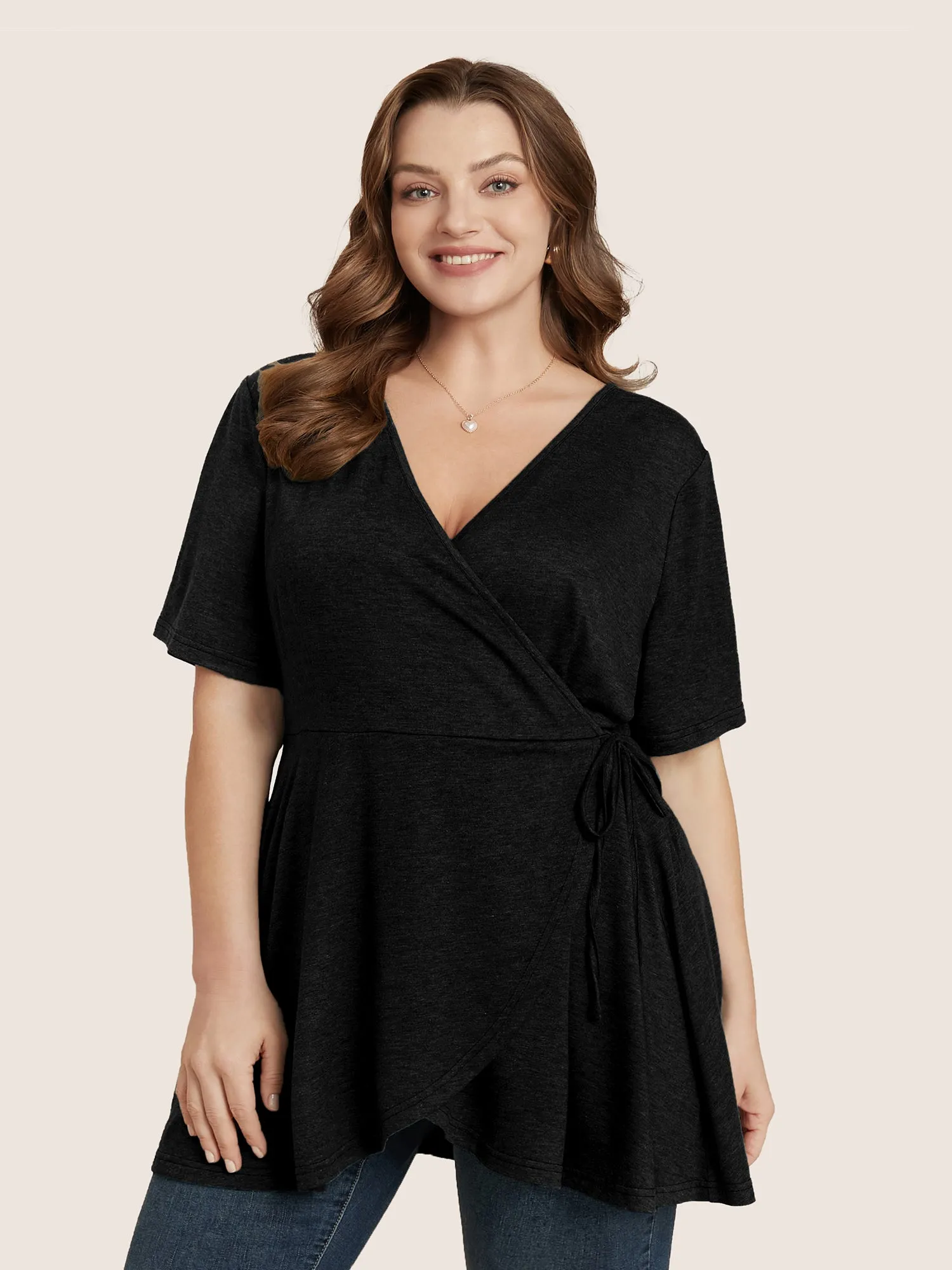 Plain Surplice Neck Tie Side Asymmetrical Hem T-shirt sold by Bloomchic