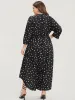 Graphic Pocket Surplice Neck Shirred Arc Hem Dress sold by Bloomchic