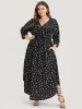 Graphic Pocket Surplice Neck Shirred Arc Hem Dress sold by Bloomchic