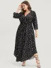 Graphic Pocket Surplice Neck Shirred Arc Hem Dress sold by Bloomchic