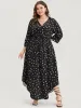 Graphic Pocket Surplice Neck Shirred Arc Hem Dress sold by Bloomchic