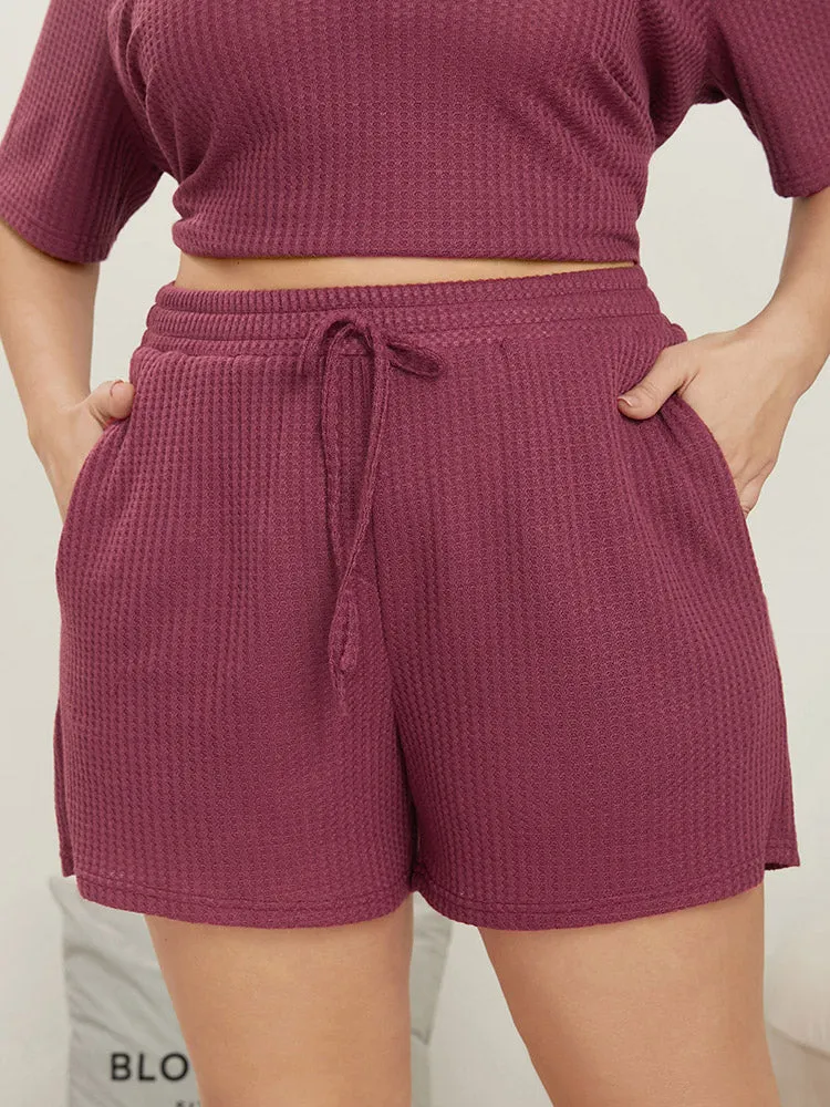 Solid Elastic Waist Pocket Ties Waffle Knit Sleep Shorts sold by Bloomchic