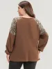 Leopard Patchwork Lantern Sleeve Twist Front Sweatshirt sold by Bloomchic
