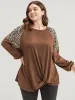 Leopard Patchwork Lantern Sleeve Twist Front Sweatshirt sold by Bloomchic