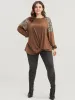 Leopard Patchwork Lantern Sleeve Twist Front Sweatshirt sold by Bloomchic