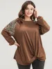 Leopard Patchwork Lantern Sleeve Twist Front Sweatshirt sold by Bloomchic