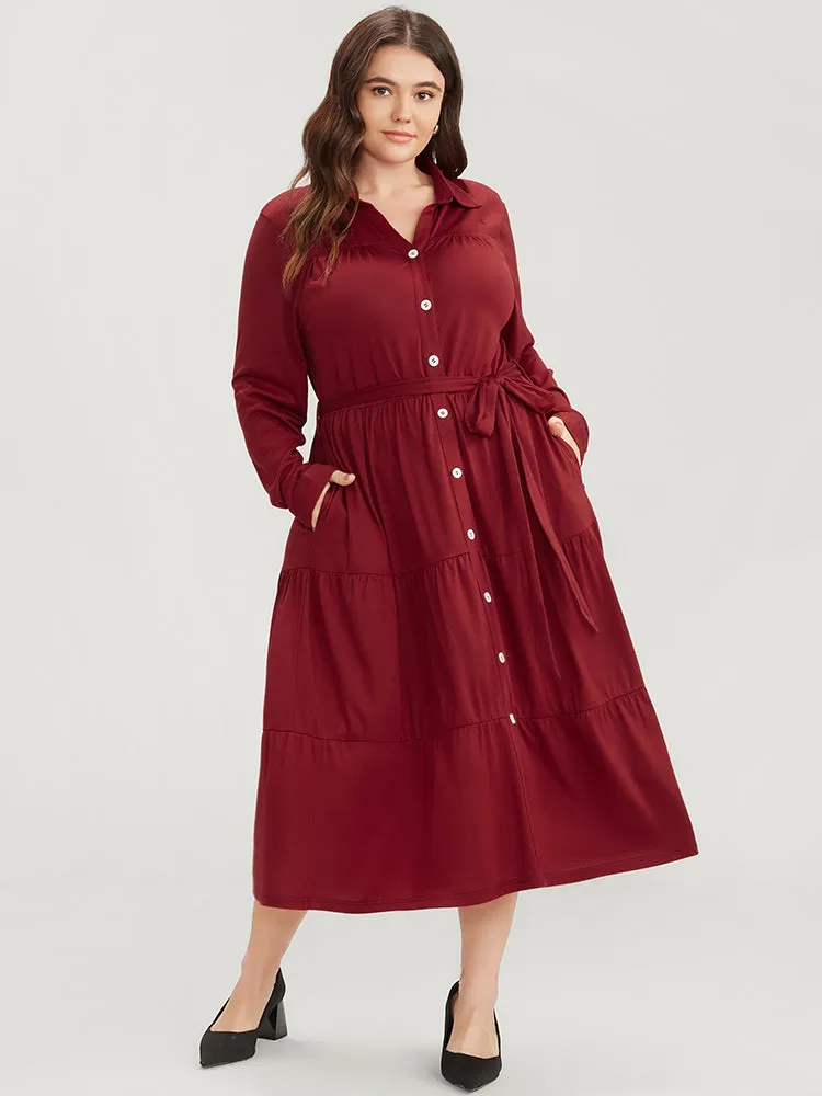 Solid Pocket Button Up Belted Flutter Dress sold by Bloomchic