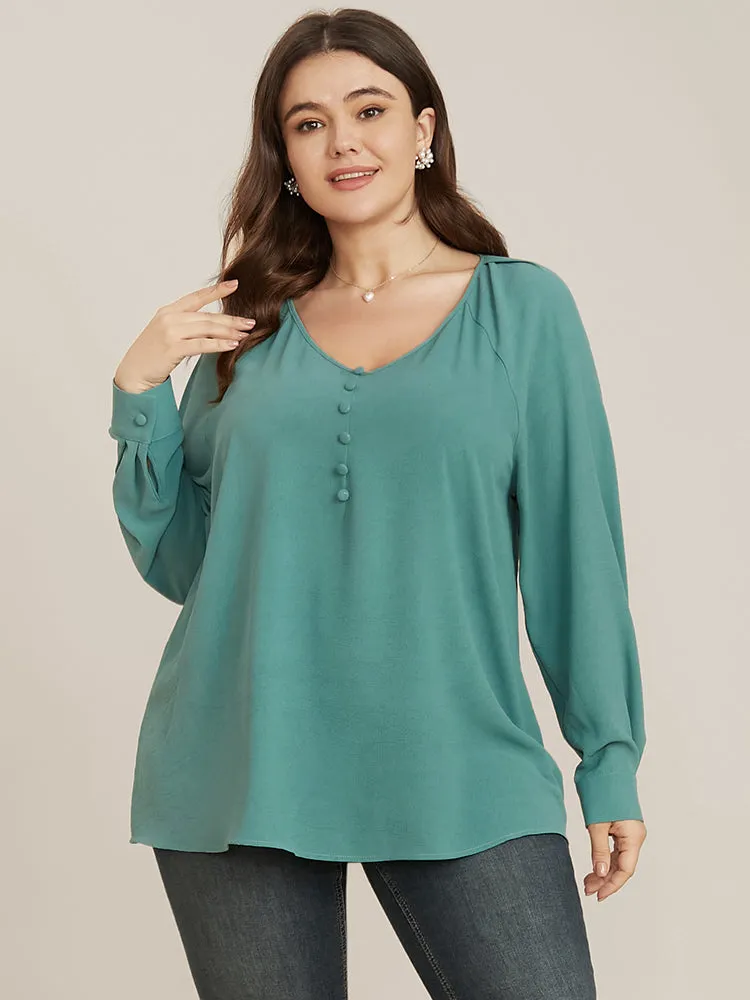Solid V Neck Button Detail Blouse sold by Bloomchic