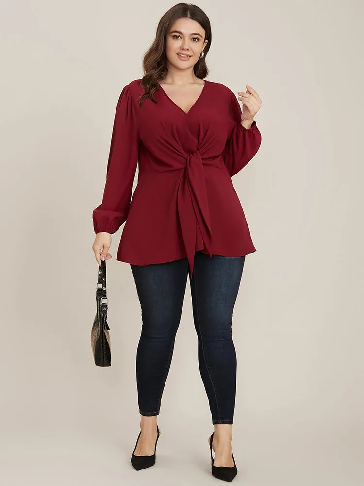 Solid V Neck Lantern Sleeve Knotted Front Blouse sold by Bloomchic product image thumbnail 5