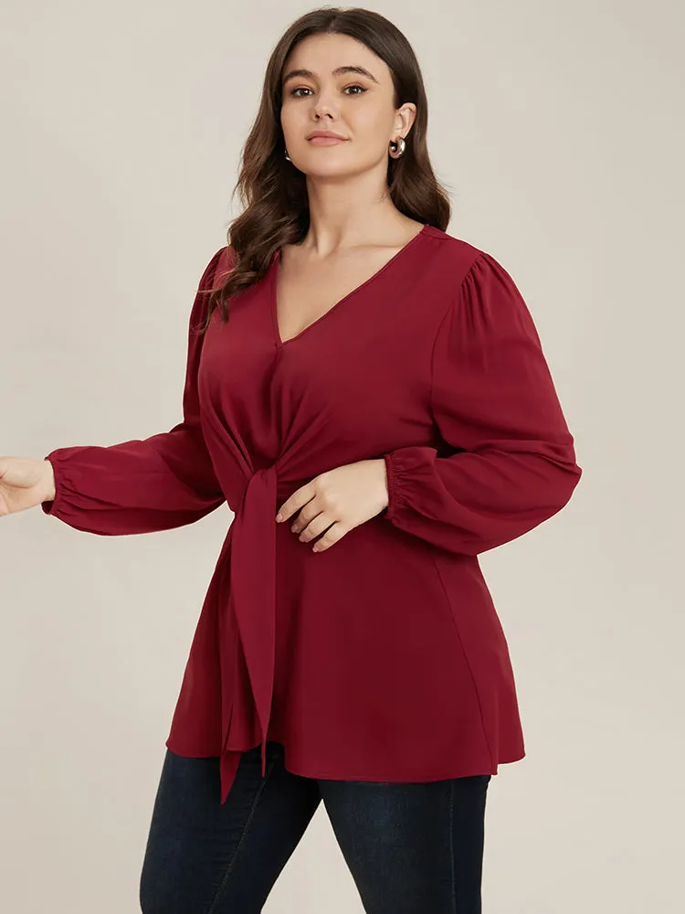 Solid V Neck Lantern Sleeve Knotted Front Blouse sold by Bloomchic product image thumbnail 3