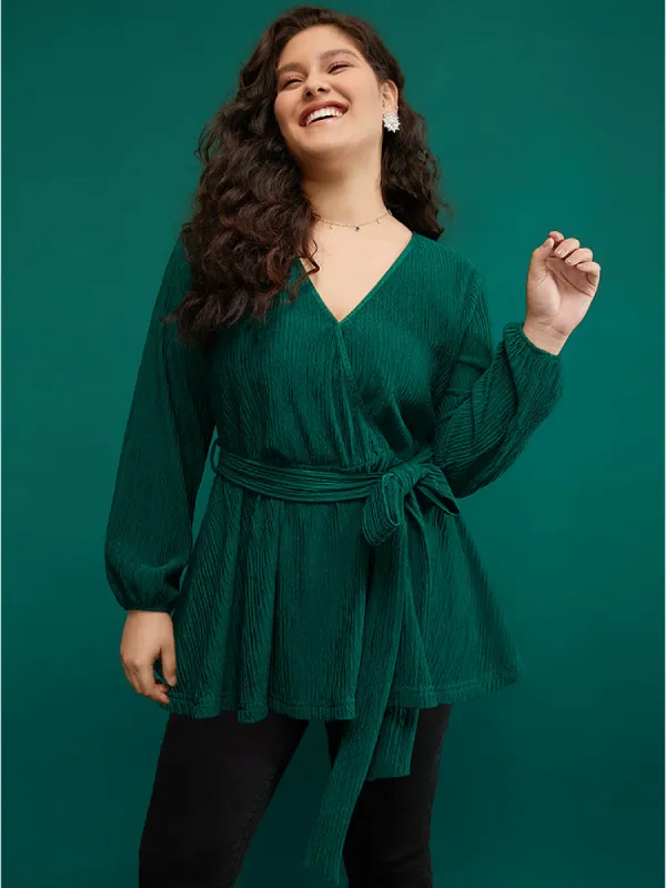 Solid Textured Lantern Sleeve Belted Wrap Blouse sold by Bloomchic