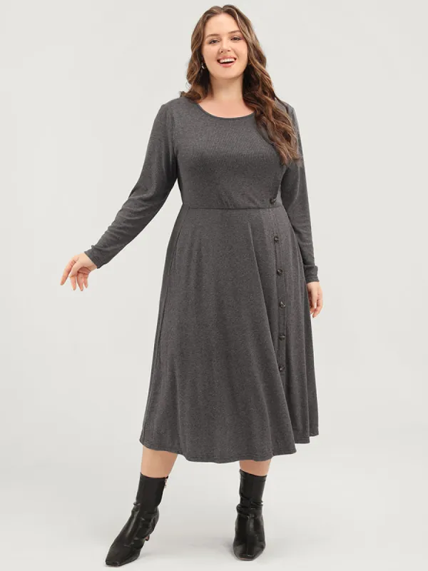 Solid Round Neck Pocket Button Detail Ruffle Hem Dress sold by Bloomchic