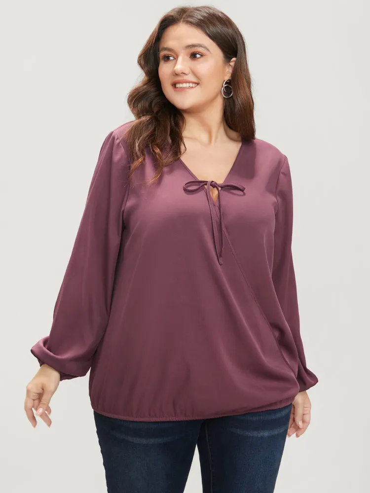 Solid Lantern Sleeve Tie Neck Wrap Blouse sold by Bloomchic product image thumbnail 2