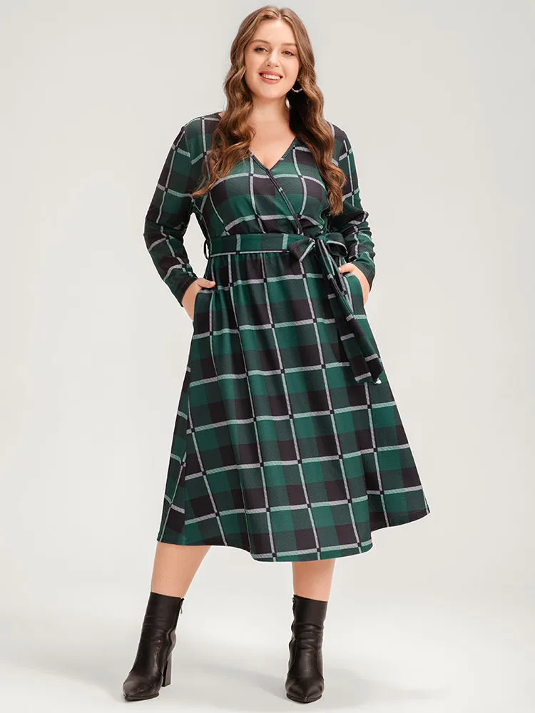 Plaid Surplice Neck Pocket Belted Midi Dress sold by Bloomchic