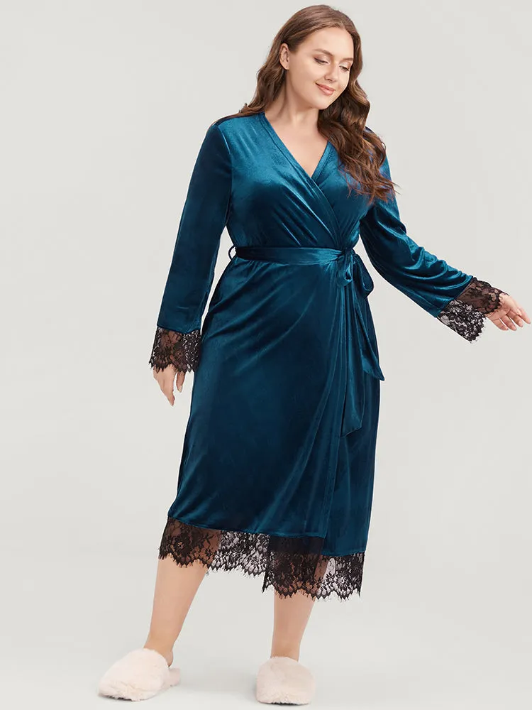 Solid Lace Trim Belted Wrap Velvet Midi Dress sold by Bloomchic