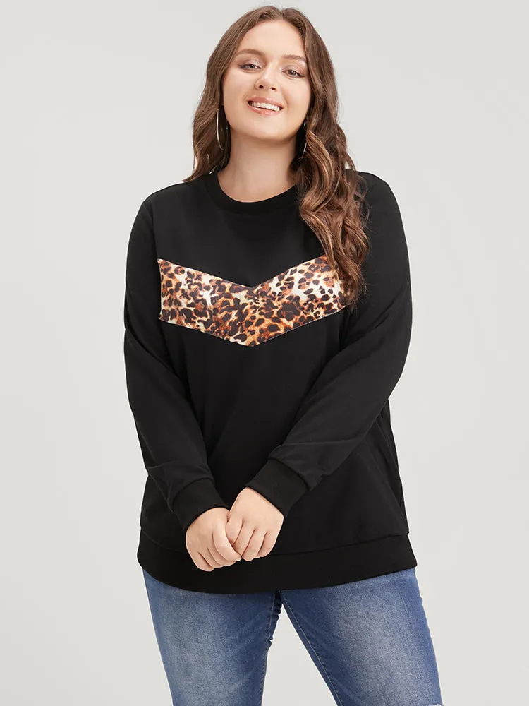 Leopard Patchwork Round Neck Drop Shoulder Sweatshirt sold by Bloomchic