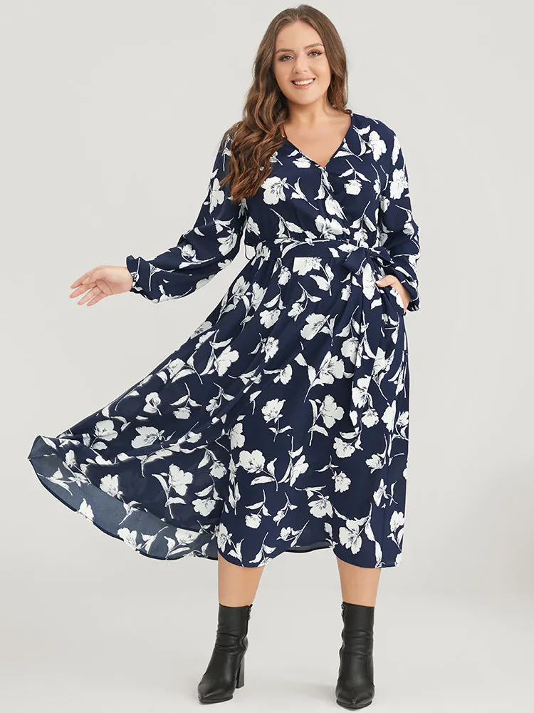 Floral Pocket Surplice Neck Belted Midi Dress sold by Bloomchic