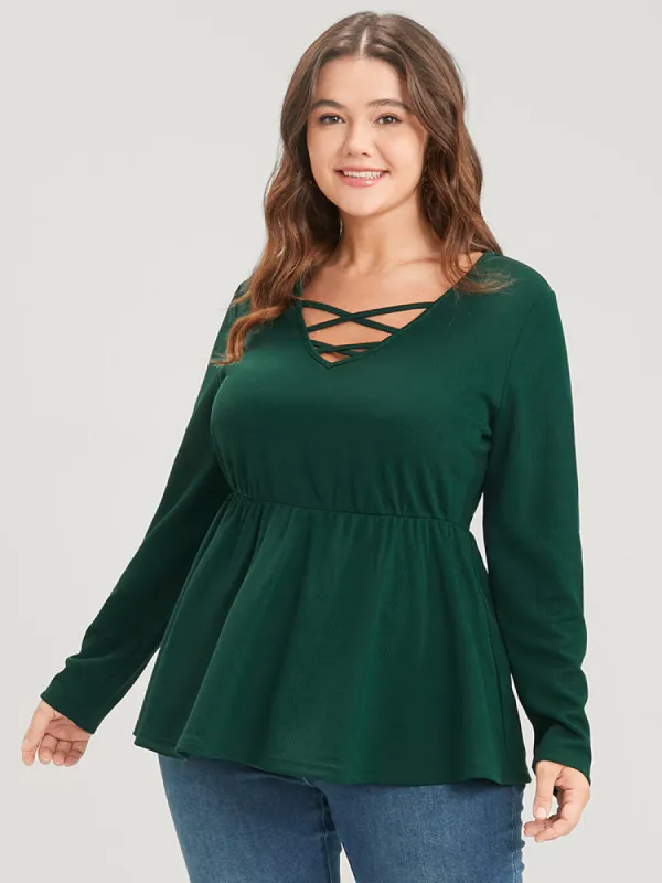 Solid Crisscross V Neck Flutter Hem Long Tee sold by Bloomchic