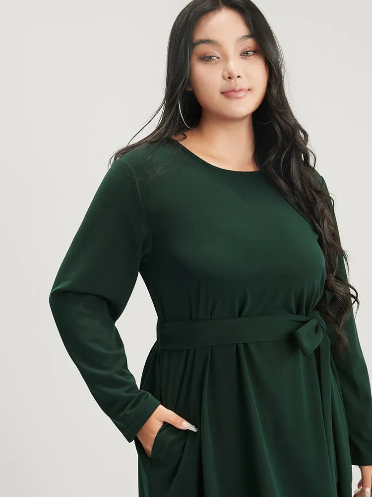 Solid Pocket Laser Cut Asymmetrical Hem Belted Dress sold by Bloomchic product image thumbnail 5