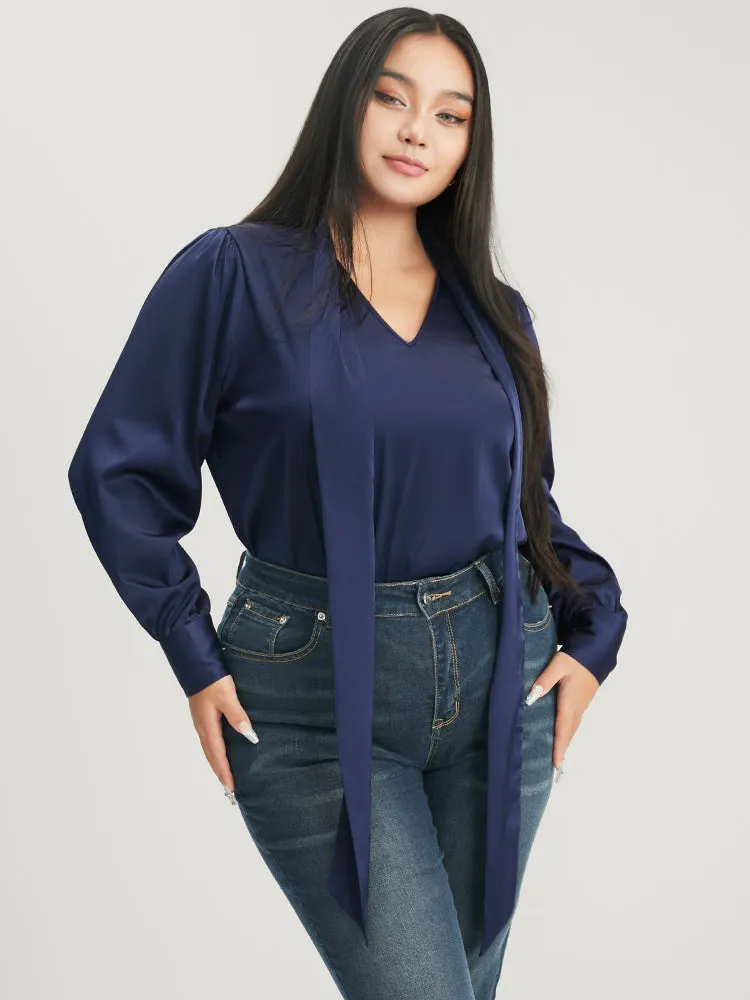 Solid Knotted V Neck Satin Blouse sold by Bloomchic