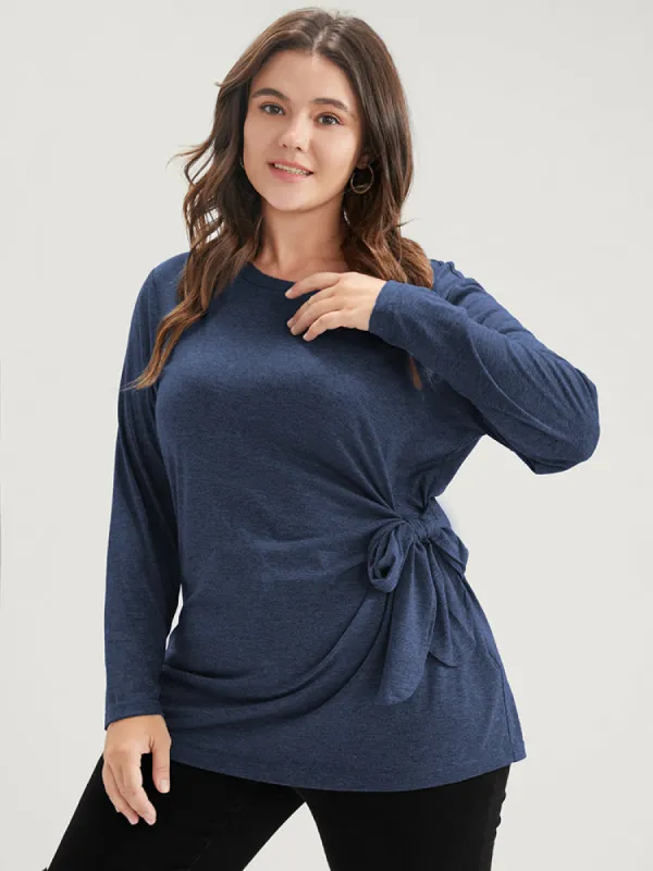 Solid Twist Front Knotted Round Neck Long Tee sold by Bloomchic
