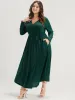Solid Wrap Pocket Belted Asymmetrical Hem Dress sold by Bloomchic
