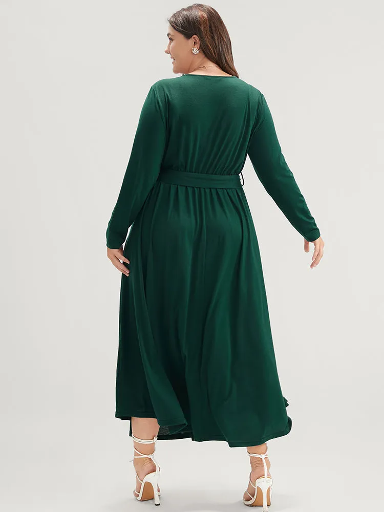 Solid Wrap Pocket Belted Asymmetrical Hem Dress sold by Bloomchic product image thumbnail 2
