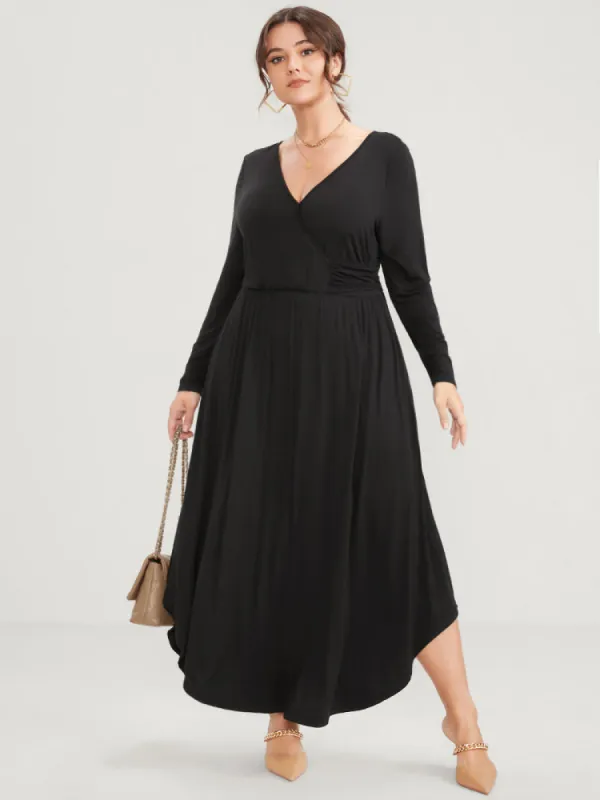Solid Pocket Button Elastic Waist Wrap Arc Hem Dress sold by Bloomchic