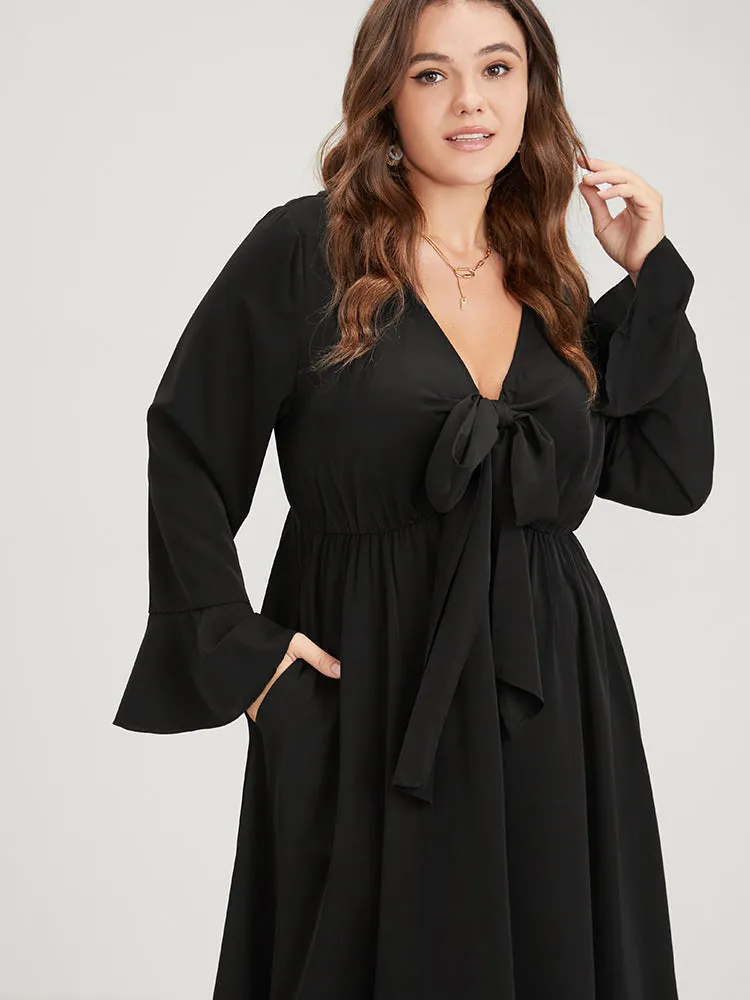 Solid Bell Sleeve Pocket Knotted Neck Arc Hem Dress sold by Bloomchic product image thumbnail 5