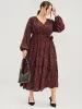 Pocket Button Surplice Neck Allover Print Belted Dress sold by Bloomchic