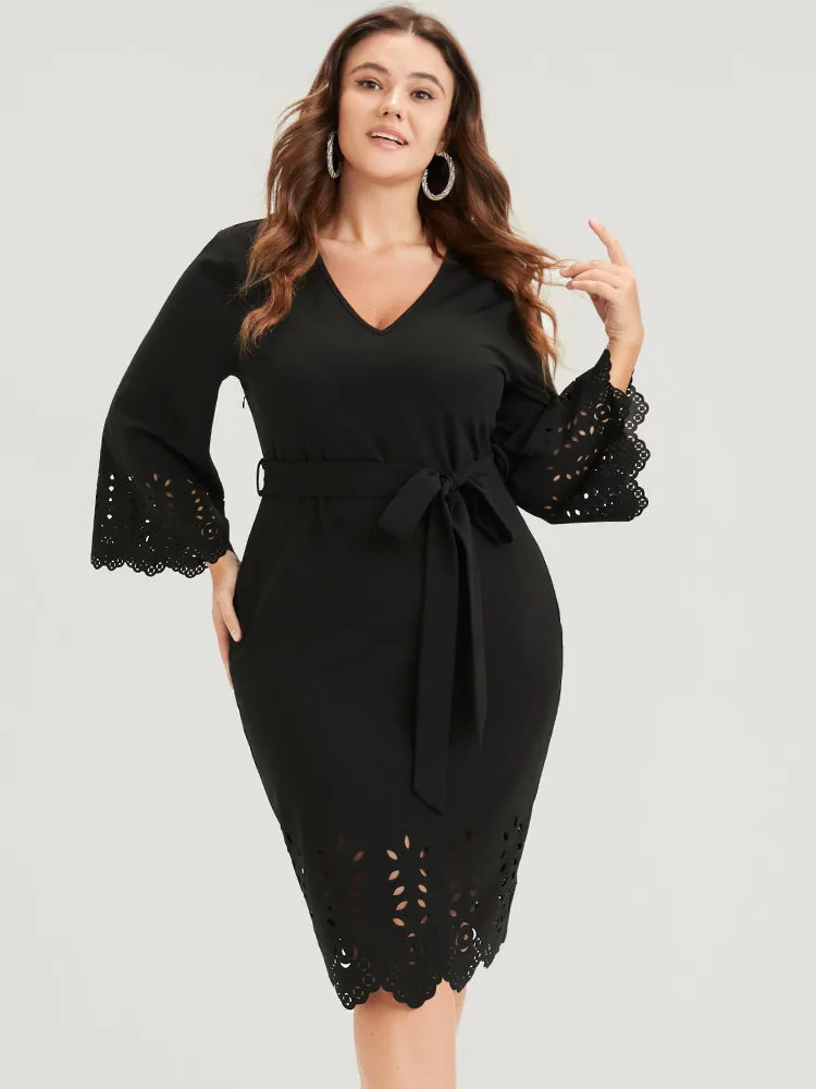 Solid Laser Cut Bell Sleeve Belted Knee Dress sold by Bloomchic