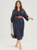 Asymmetrical Striped Patchwork Button Pocket Cuffed Sleeve Midi Dress sold by Bloomchic