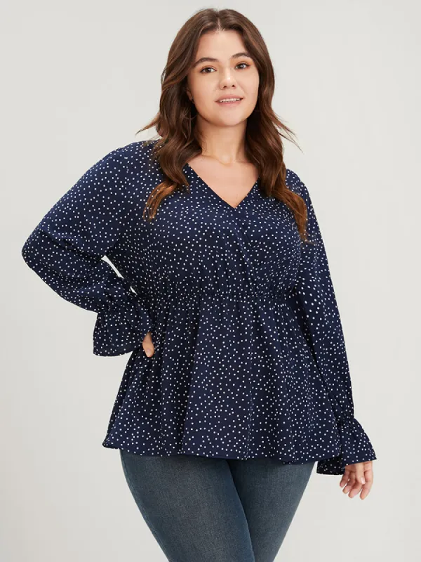 Polka Dot Button Lantern Sleeve Ruffles Hem Wrap Blouse sold by Bloomchic