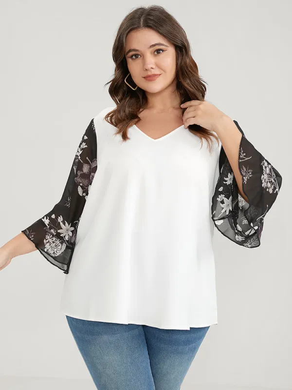 Solid Patchwork Floral Flounce Sleeve V Neck Blouse sold by Bloomchic