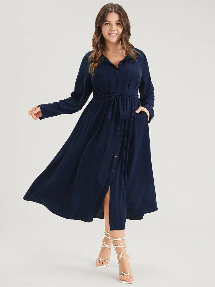 Solid Button Pocket Flutter Knotted Shirt Collar Midi Dress sold by Bloomchic